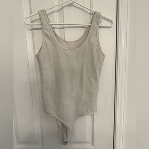 Cream twik body suit